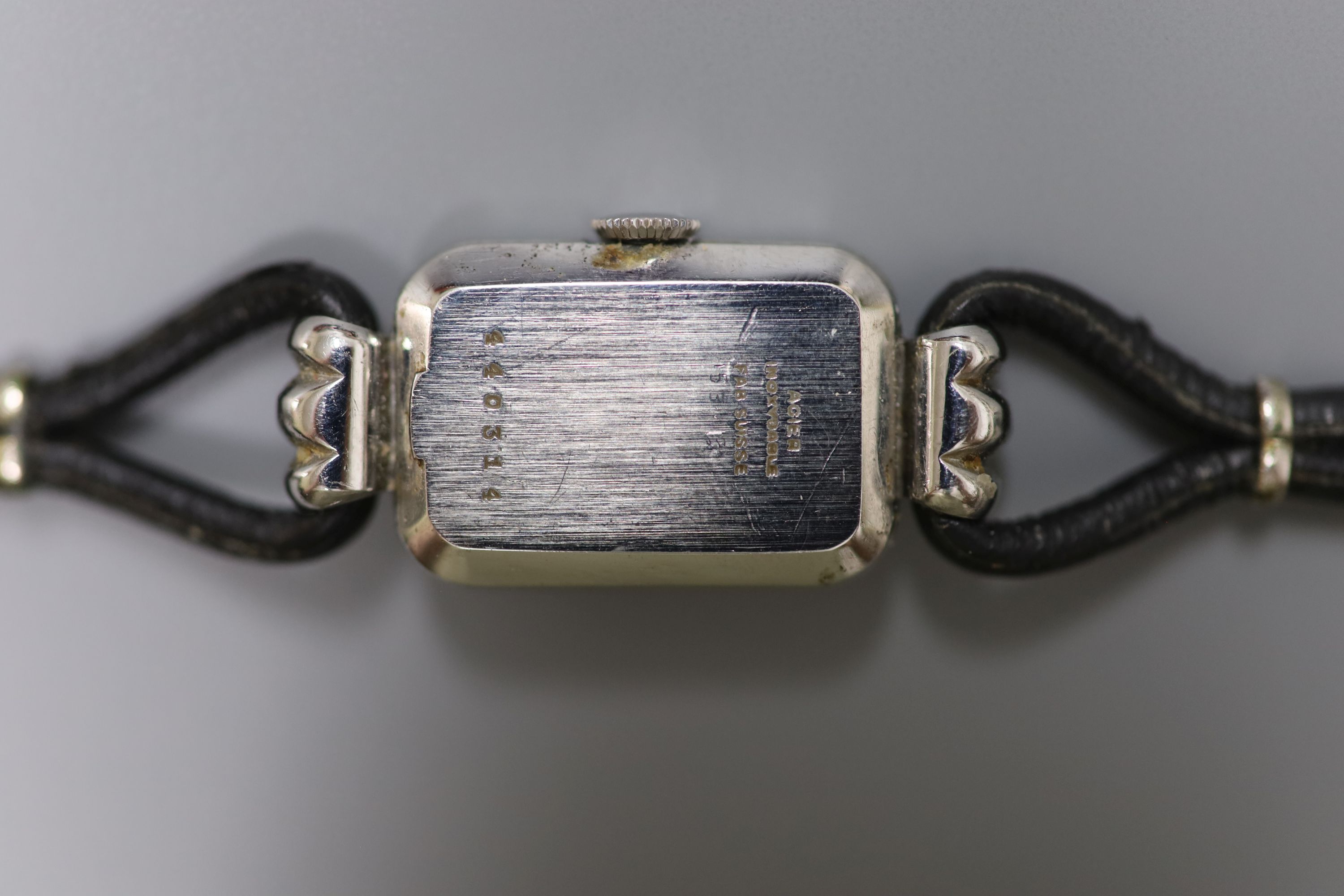 A lady's Art Deco stainless steel Jaeger LeCoultre rectangular dial wrist watch, on a fabric twin strand strap
